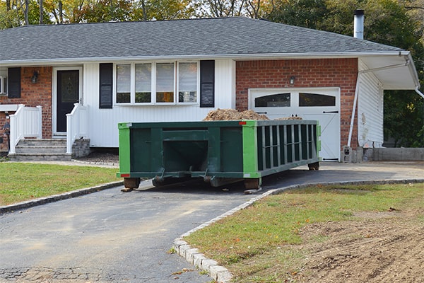 residential dumpsters typically come with a lid or cover to keep debris contained and prevent wildlife from accessing the contents